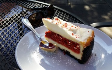 Red Velvet Cheesecake: Red velvet cake between layers of NY style cheesecake with a chocolate cookie crumb crust