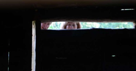 Heidi and Tom peeking in the Cabin