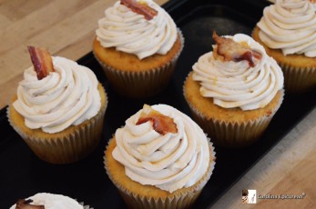 Savory Maple Bacon Cupcakes topped with sweet maple icing. Spotlight Bakery
