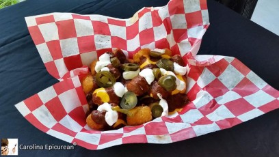 Loaded Tots. They're topped with chili and cheese. So good! Splash Country