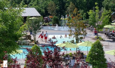 Looking out at the expansive pool area and splash pad from the Resort lobby. Dollywood-DreamMore Resort