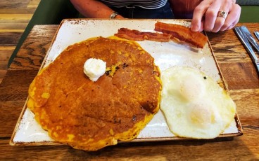 Pumpkin pancake w/two eggs and bacon