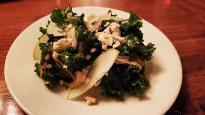 Kale Salad: marinated local kale, sweet onions, bleu cheese, and shaved apples, tossed in an apple cider-rosemary vinaigrette served with "Grains of Paradise" rice. NEW MENU COMING SOON