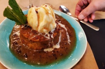 Don't judge by looks alone. :) This dessert was fabulous! Pumpkin Love: gooey & delicious pumpkin spice croissant bread pudding served warm with cranberry-bourbon caramen and house-made vanilla bean ice cream.