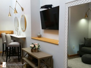 A lovely space with dressing area, sofa, bathroom